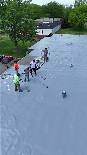 Rolling Silicone Coating Onto Roof #shorts #roofing #coating #silicone #construction #seamless