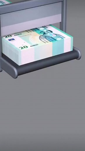 Banknotes Processing: Machine in Action with Currency