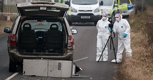 ATM abandoned on road after thieves use tractor to rip it from shop