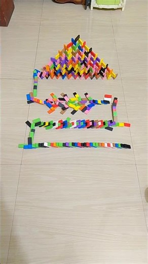 Multicolored Dominotricks 2d pyramid domino set-up domino chain reaction #shorts #shortsfeed #domino
