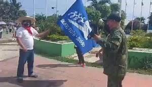 Police officers disperse members of cause-oriented groups as they failed to present any permit to hold a protest in front of the Cebu International Convention Center in Mandaue City Tuesday, November 30, 2021. via Ivan Rey Tan | SunStar Cebu