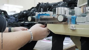 Cotton socks production process in garment factory, automated process, sewing up the sock Stock Video