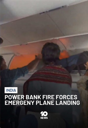 A mid-flight power bank fire has sparked fresh warnings about lithium batteries on planes after an overhead bin caught alight on a domestic flight in India. The IndiGo flight from Delhi was forced to make an emergency landing as passengers and crew rushed to extinguish the blaze. For more of 10 News, click the link in bio.