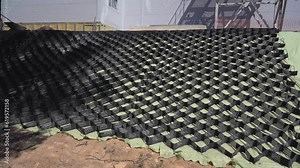 geogrid for strengthening slopes. Polymer geogrid for filled with soil