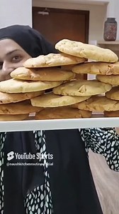 Subway Nut Cookies Ingredients (16-18 cookies) • Plain flour 2 cups (280 grams) • Baking soda 1/2 tsp • Salt 1/2 tsp • Butter 3/4 cup (95 grams), at room temperature • Egg 1, at room temperature • Egg yolk 1, at room temperature • Sugar 1/2 cup (138 grams) • Vanilla essence 1 tbsp (add less if your vanilla essence is bitter) • White chocolate chips 1/2 cup • Macadamia nuts 1 cup, chopped into big chunks (or any other nuts) Preparation 1. Preheat the oven at 160˚C using upper and lower rod. 2. In
