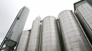 Industrial metal containers of a factory - Free Stock Video