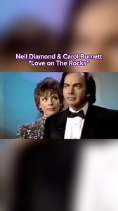 A hilarious 1986 performance of Neil’s classic “Love on the Rocks,” featuring Carol Burnett. | Neil Diamond