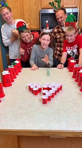 Perfect Family Christmas Party Game 🎁 We created a perfect challenge for Christmas and holiday parties this winter season. Dad, mom, and the kids play funny family kitchen game where they bounce ping pong balls into mini cups for prizes 🎬 This video was produced by Network Media and Benson Bros | Rick Lax