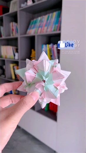 paper crafts creator on Instagram: "Pastel Origami Magic #fblifestyle #origamiart #papercraft #diydecor"