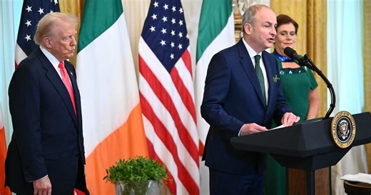 Taoiseach Micheál Martin presents US president Donald Trump with the traditional bowl of shamrocks