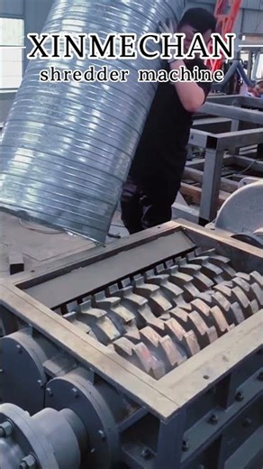 Check out this shredder in action—it’s chomping through that bulky metal material like a pro!