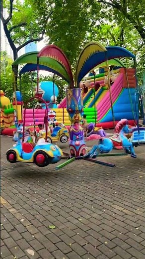 Mini blue elephant carousel and Doraemon swinging balloon