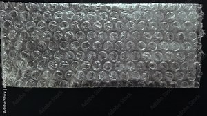 Cellophane and plastic white background. The texture of old plastic`s packing with balls