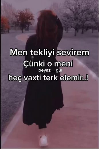 Woman Walking in Park: A Daytime Stroll