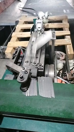 Metal Rod Cutting Process in Workshop Environment
