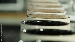 Coffee carefully diluted with water in cup closeup. Tool allows even mixing of two liquids in cup. Change of coffee consistency