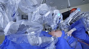 clip-1101781167-big-belly-patient-operated-by-robot-surgeon