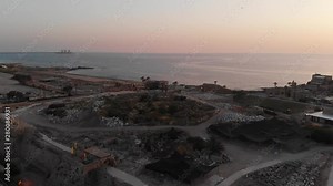 Roman amphitheater on the territory of the excavation of the city of Caesarea, Israel. View from the drone. Stock Video