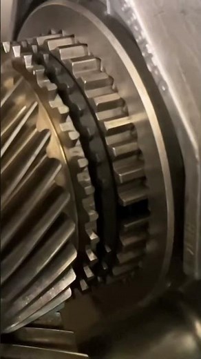 “Grinding gears” in a manual transmission is a misnomer. You’re actually grinding clutching teeth