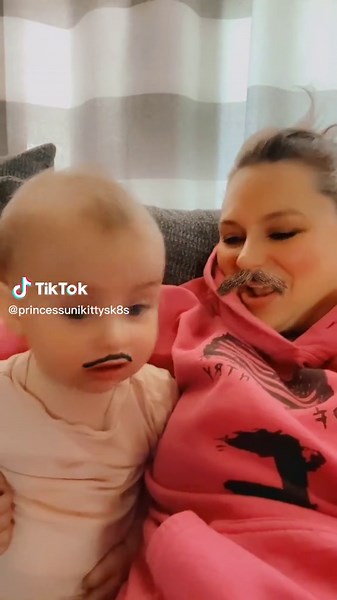 Adorable Baby with Mustache: Morning Fun with Mom and Daughter
