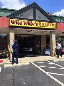 WATCH:Four Injured After Car Drives into Burger Restaurant
