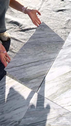 Dulcet Tile Inc. | Premium Marble Mosaics & Tiles on Instagram: "As I caught the sunset light flirting with marble greens, blues, and grays, the room felt alive 🌤️ Save this for your next design inspiration 👩🏻‍🎨 Every vein shimmered with the quiet luxury of 12x24 Calacatta Manhattan Italian marble from @dulcettile Field Collection – a NEW lot has just arrived at our Southern California warehouse! 🏷️ handcrafted marble tile · luxury mosaic tile · artisan tile design · custom marble mosaics ·