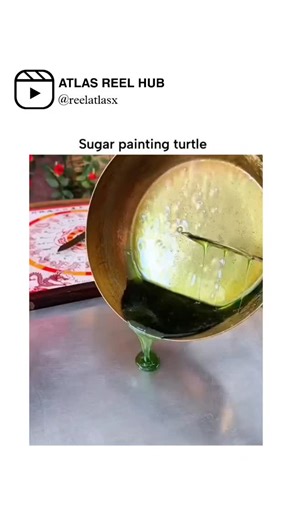 ATLAS REEL HUB on Instagram: "The post features a 18-second video demonstrating traditional sugar painting of a green turtle, using molten sugar poured and shaped with ladles and spatulas on a metal surface, set against festive Chinese decor. Sugar painting, or tánghuà, traces to China's Tang Dynasty as a folk art for creating edible figurines; turtles symbolize longevity and the mythical Black Tortoise (Xuanwu), blending artistry with cultural auspiciousness. High engagement from Indonesian use