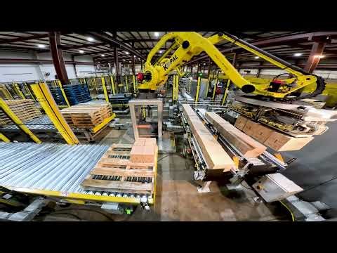 Kaufman KPal V Robotic Palletizer, EXPA-15 Stretch Wrapper, Conveyor and Transfer Car System.