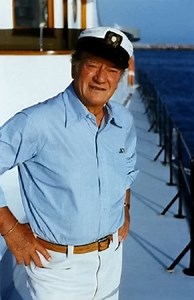 John Wayne aboard his yacht, the Wild Goose. | Legends Never Die: John Wayne