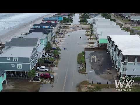 8-4-2020 Hurricane Isaias landfall in Oak Island, NC covers city in sand, drone shots
