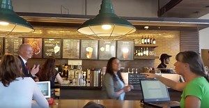Florida woman confronts governor Rick Scott in Starbucks over his slashing of social services