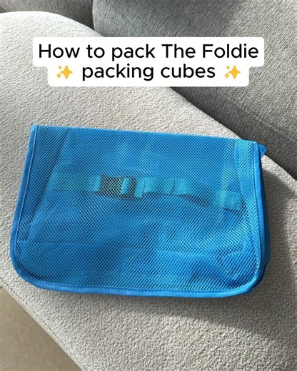 How to Pack the Foldie with our ✨ Packing Cubes ✨ 1. Roll your clothes for more space. 2. Secure the compression straps. 3. Begin with size "L" cube (horizontally). 4. Add size "M" and "S" cubes (stand them up). 5. Finish with your shoe bag. The packing cubes fit perfectly in the Foldie travel bags and come in matching colors for a seamless, stylish look! | The Foldie