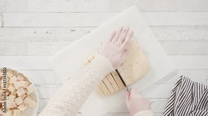 Flat lay. Step by step. Cutting homemade candy cane fudge on a white cutting board. Stock Video
