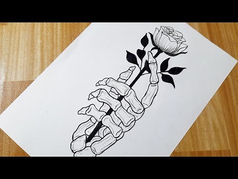 How to draw a skeleton hand holding a rose