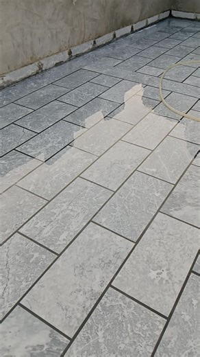 Tiling Process on a Flat Rooftop: Step-by-Step Guide