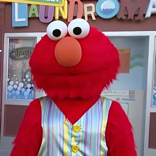 Elmo is having a Peanut Butter and Jelly Sandwich for Snack