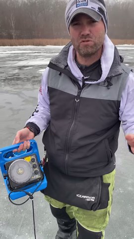 Matt Johnson Outdoors uses his Vexilar (transducer) to read through the ice to find his desired depth and the fish before breaking out the auger! With a little water on top of the ice, you can shoot right through it with your transducer and find the fish quickly… then punch your holes and game on!! #icefishing #vexilar #sonar #ice #efficiency | Vexilar