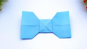 9.2K views · 29 reactions | Origami Tutorial to make an easy Paper Father's Day Card Tie | Handmade Father's Day Greeting Card #PaperSurpriseCard #Father'sDayTie #PaperFather'sDayCard | Entertaining Arts | Facebook