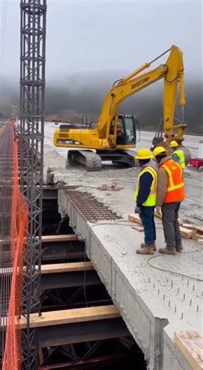 Excavator Plunges as Bridge Deck Suddenly Collapses