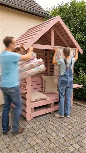 DIY Cozy Pink Wooden Garden Gazebo with Floral Curtains and Rustic Seating