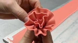 In one smooth motion, this chef forms delicate chocolate flowers. | Insider Food