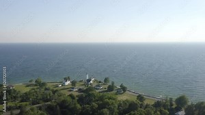High Aerial Shot Of Tibbetts Point Lighthouse On St Lawrence River In Cape Vincent, New York Stock Video