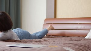 Cheerful Woman Rolling Around On Bed Stock Footage Video (100% Royalty-free) 1029632189 | Shutterstock