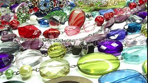 bright crystals beads and rings fashion background