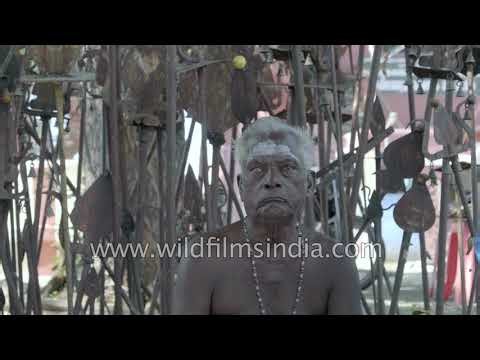 Karuppu Sami village shrine with ritual tridents in rural Tiruchirappalli, Tamil Nadu