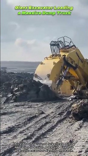 Giant Excavator Loading a Massive Dump Truck