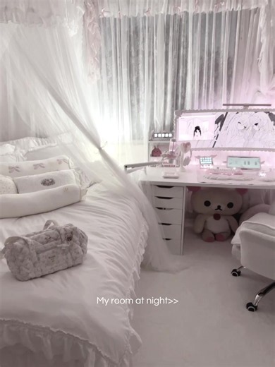 Pink gaming setup ideas for a cozy room at night