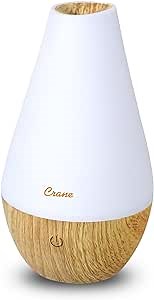 Crane Aroma Therapy Diffuser, 6 Ounce Tank, Essential Oils Included, Color Changing Light, 9 Hour Run Time, Auto Shutoff, Wood Base