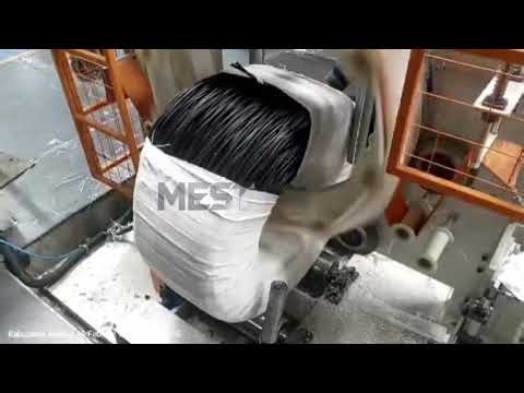 Machine for wrapping coils
