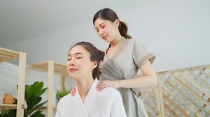 Woman Receiving a Shoulder Massage at a Spa | Free Stock Video Footage